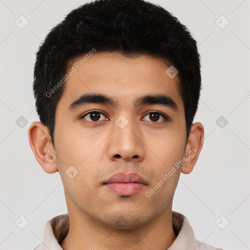 Neutral latino young-adult male with short  black hair and brown eyes