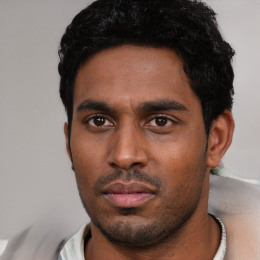 Neutral black young-adult male with short  black hair and brown eyes