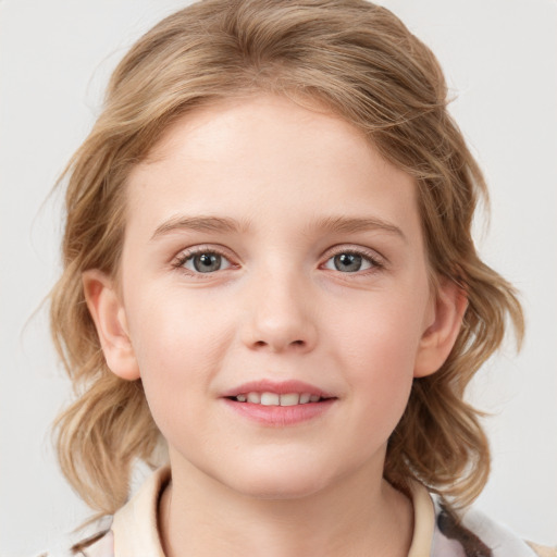 Joyful white child female with medium  brown hair and blue eyes