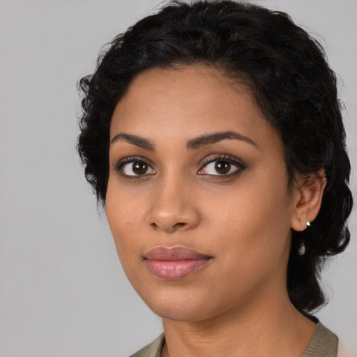 Neutral latino young-adult female with long  black hair and brown eyes
