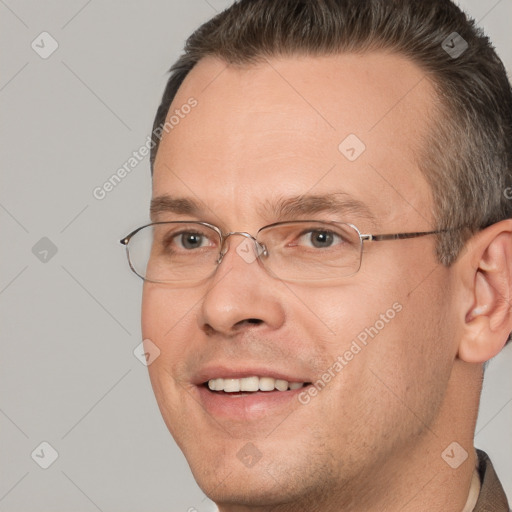 Joyful white adult male with short  brown hair and brown eyes