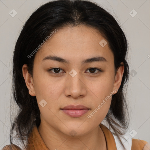 Joyful latino young-adult female with medium  brown hair and brown eyes