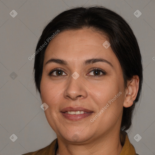 Joyful white adult female with medium  brown hair and brown eyes