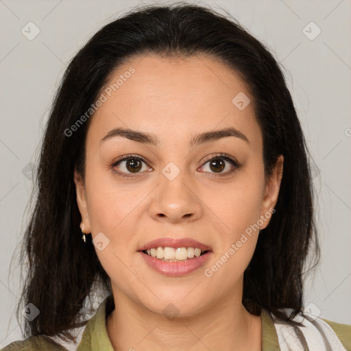 Joyful latino young-adult female with medium  brown hair and brown eyes