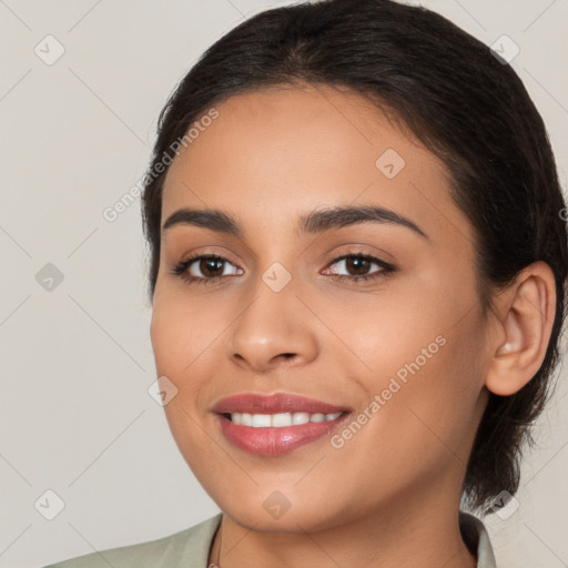 Joyful white young-adult female with medium  brown hair and brown eyes