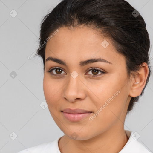 Joyful latino young-adult female with medium  brown hair and brown eyes