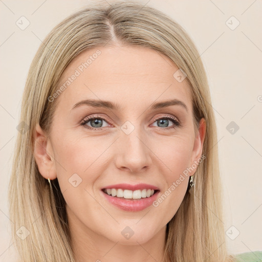 Joyful white young-adult female with long  brown hair and green eyes