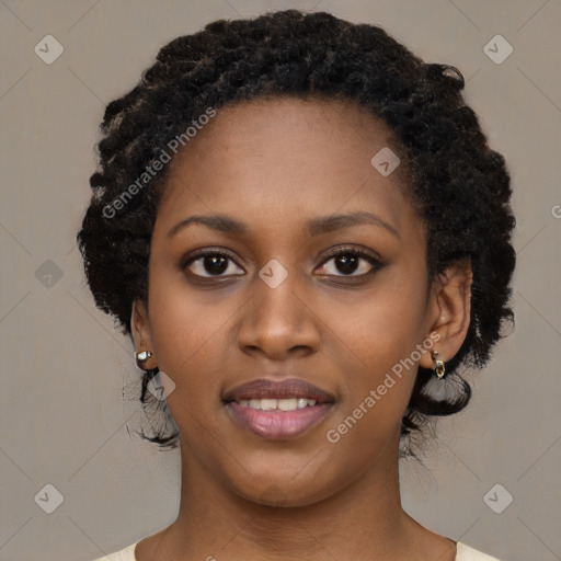 Joyful black young-adult female with medium  black hair and brown eyes