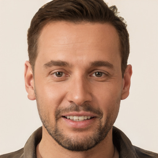 Joyful white young-adult male with short  brown hair and brown eyes