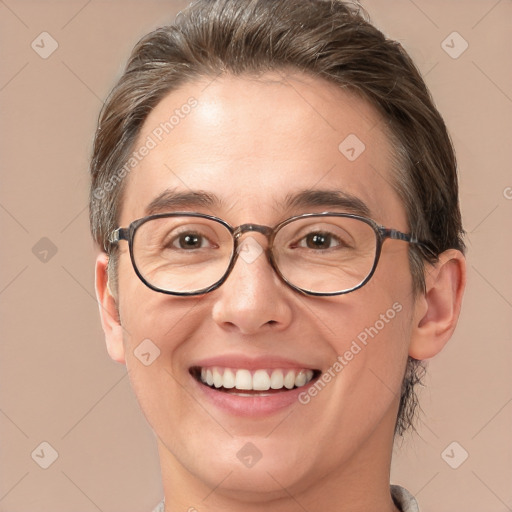 Joyful white adult female with short  brown hair and brown eyes