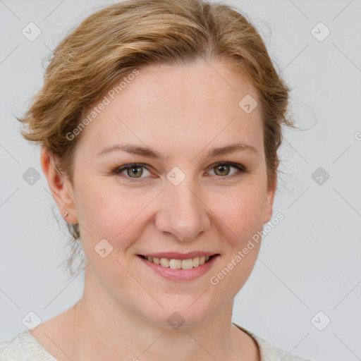 Joyful white young-adult female with medium  brown hair and blue eyes