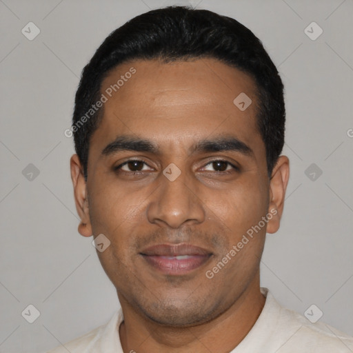 Joyful latino young-adult male with short  black hair and brown eyes