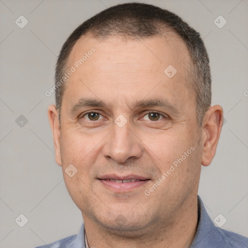 Joyful white adult male with short  brown hair and brown eyes