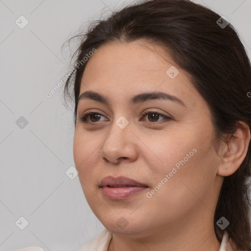 Joyful white young-adult female with medium  brown hair and brown eyes