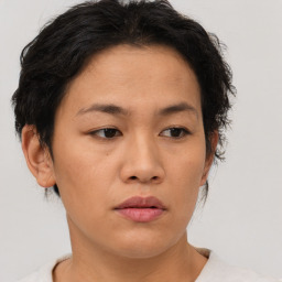 Neutral asian young-adult female with short  brown hair and brown eyes