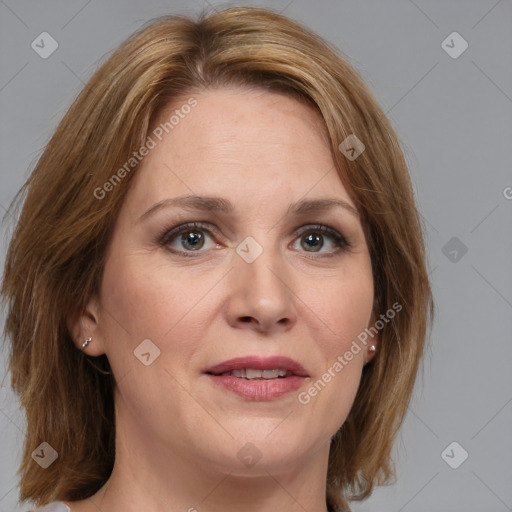 Joyful white adult female with medium  brown hair and brown eyes