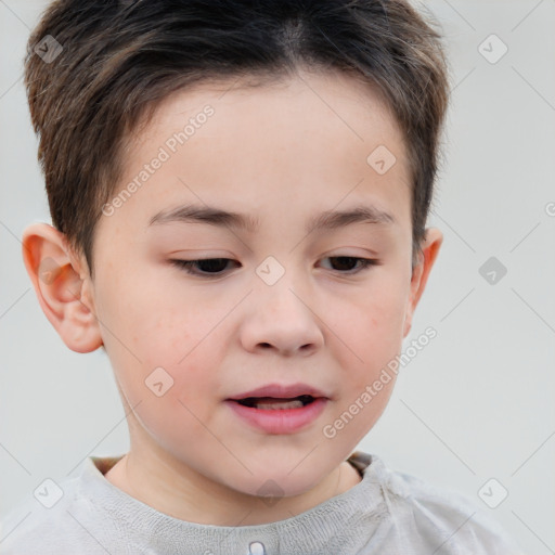 Joyful white child male with short  brown hair and brown eyes