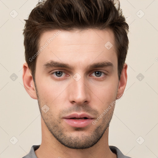 Neutral white young-adult male with short  brown hair and brown eyes