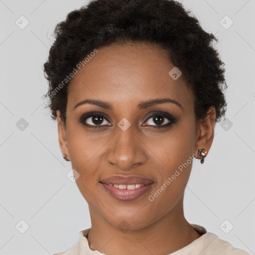 Joyful black young-adult female with short  brown hair and brown eyes