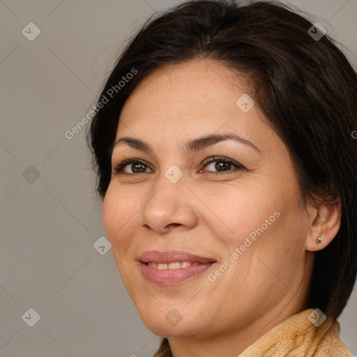 Joyful white adult female with medium  brown hair and brown eyes