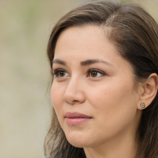 Neutral white adult female with long  brown hair and brown eyes