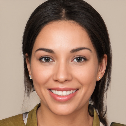 Joyful white young-adult female with medium  brown hair and brown eyes