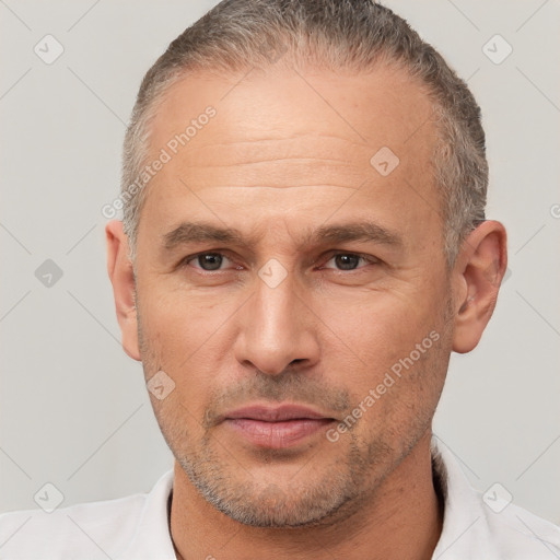 Neutral white adult male with short  brown hair and brown eyes