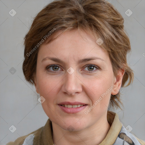 Joyful white adult female with medium  brown hair and blue eyes