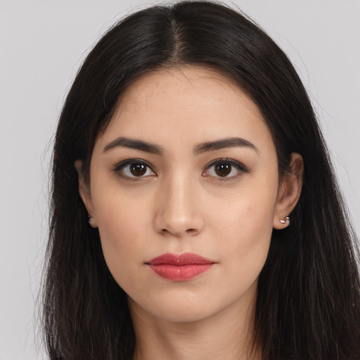 Joyful white young-adult female with long  black hair and brown eyes