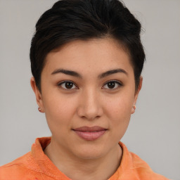 Joyful asian young-adult female with short  brown hair and brown eyes