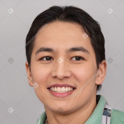 Joyful asian young-adult male with short  brown hair and brown eyes