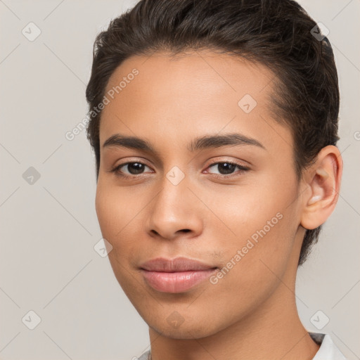 Joyful white young-adult female with short  brown hair and brown eyes