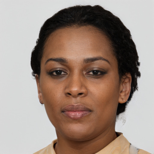 Neutral black young-adult female with short  black hair and brown eyes