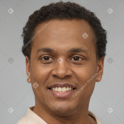 Joyful latino young-adult male with short  brown hair and brown eyes