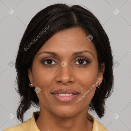 Joyful latino young-adult female with medium  brown hair and brown eyes