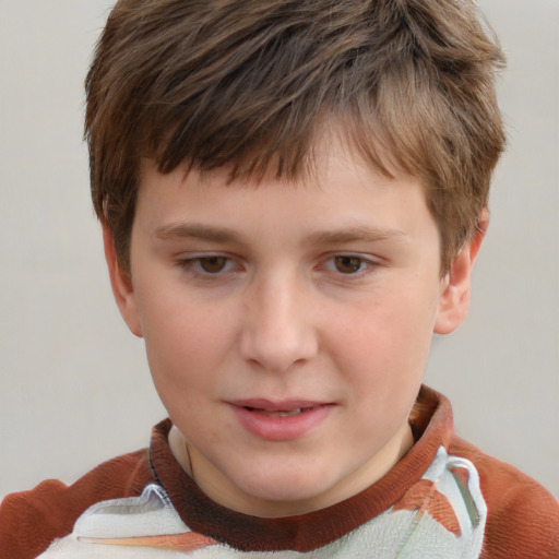 Joyful white child male with short  brown hair and grey eyes