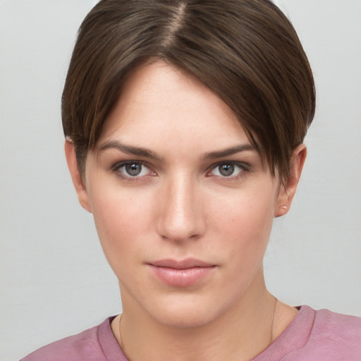 Neutral white young-adult female with short  brown hair and brown eyes