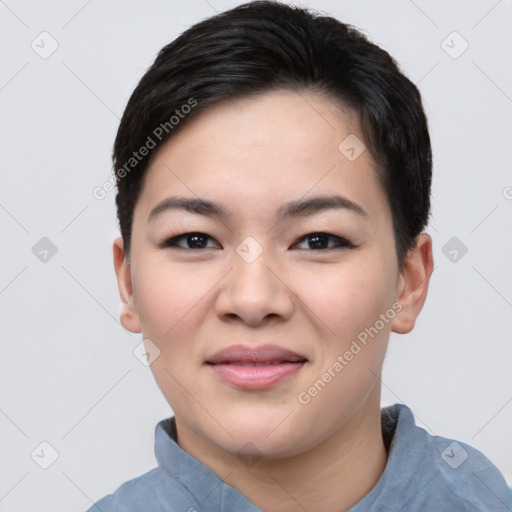 Joyful asian young-adult female with short  black hair and brown eyes