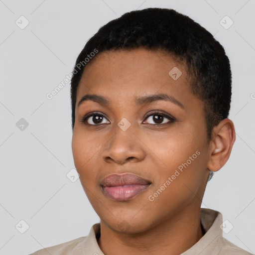 Joyful black young-adult female with short  black hair and brown eyes