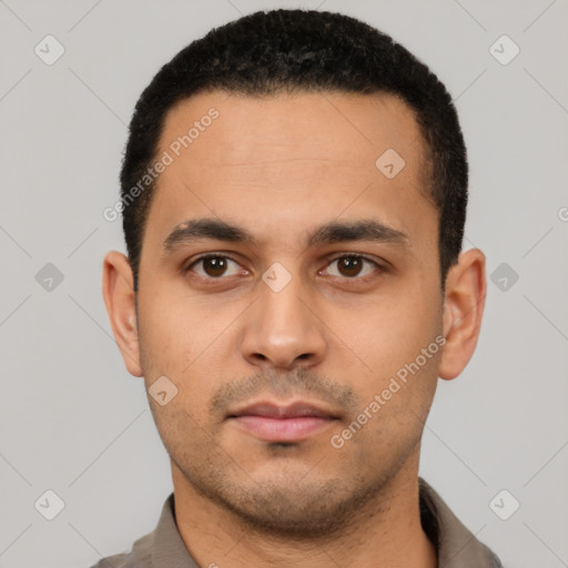 Neutral latino young-adult male with short  black hair and brown eyes