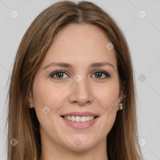 Joyful white young-adult female with long  brown hair and brown eyes