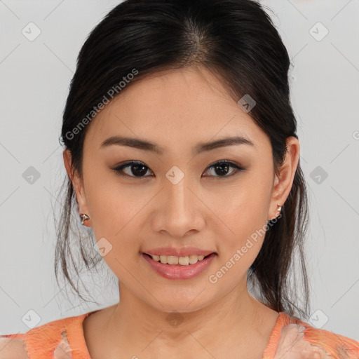 Joyful asian young-adult female with medium  brown hair and brown eyes