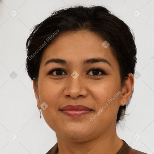 Joyful latino young-adult female with short  brown hair and brown eyes