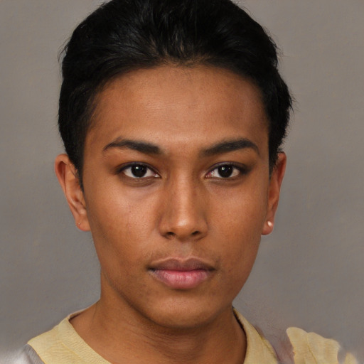 Neutral black young-adult female with short  black hair and brown eyes
