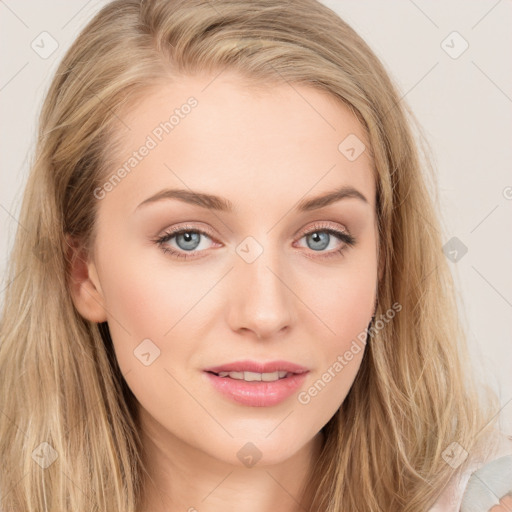 Joyful white young-adult female with long  brown hair and blue eyes