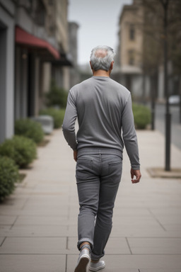 Romanian adult male with  gray hair