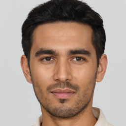 Neutral asian young-adult male with short  black hair and brown eyes