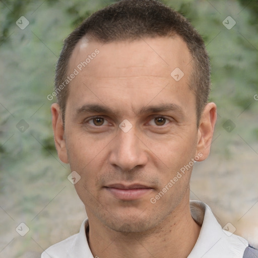 Joyful white adult male with short  brown hair and brown eyes