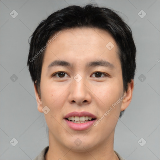 Joyful asian young-adult male with short  brown hair and brown eyes