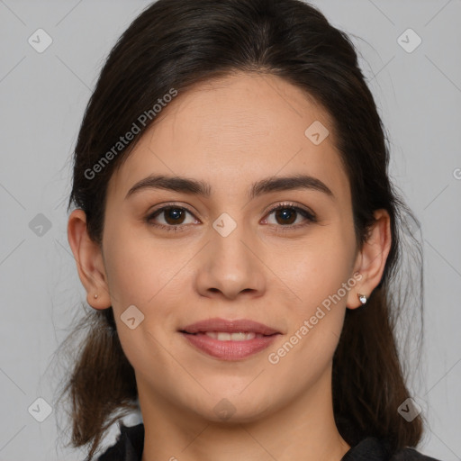 Joyful white young-adult female with medium  brown hair and brown eyes